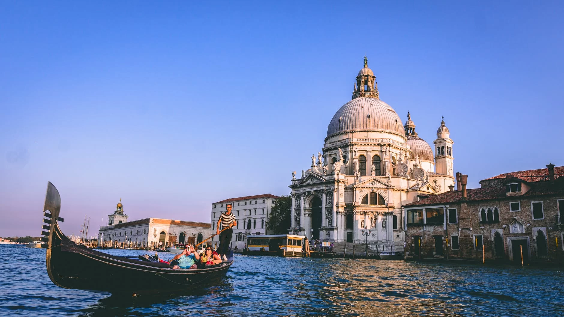 people on a gondola - Best Places to visit in Europe in December