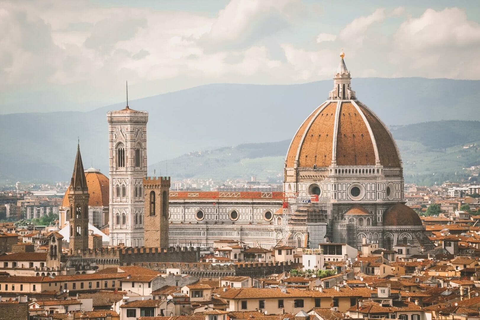 brown and white concrete building - Top Things to do in Florence