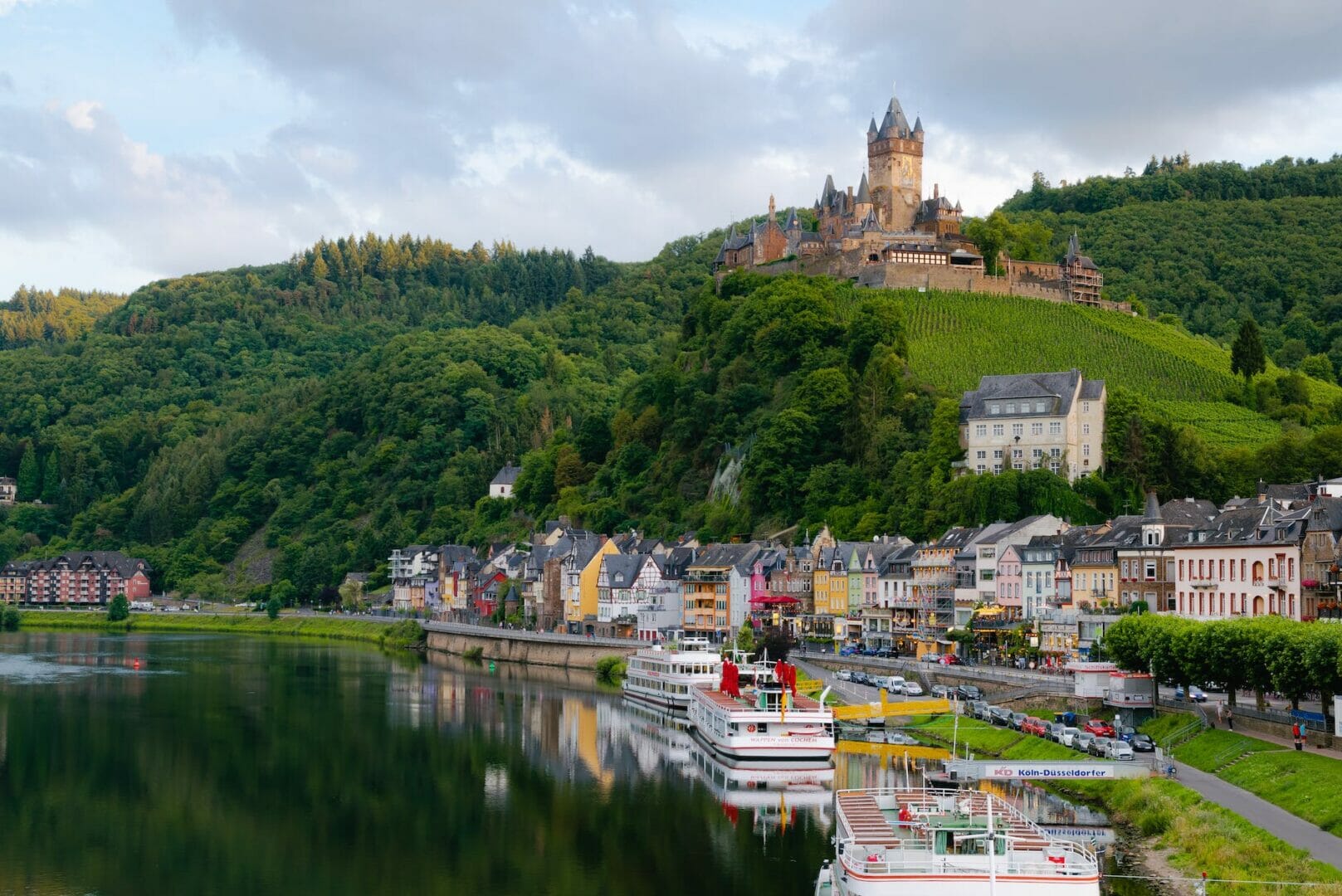 castle on hill over village near body of water - Europe Travel Tips